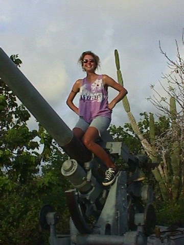 Dorothy atop big gun
